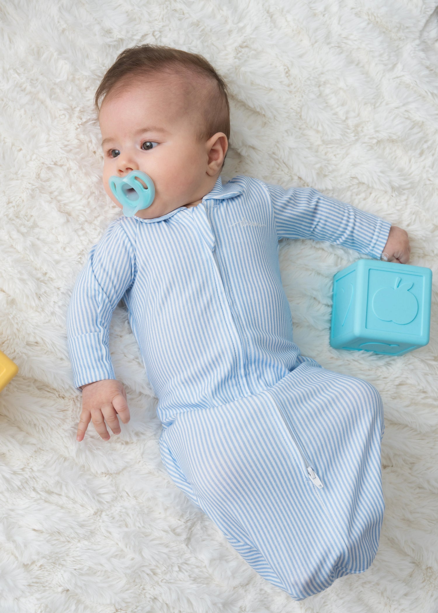 Organic baby pajamas in soft fabric, perfect for all-night comfort and gentle on sensitive skin.
